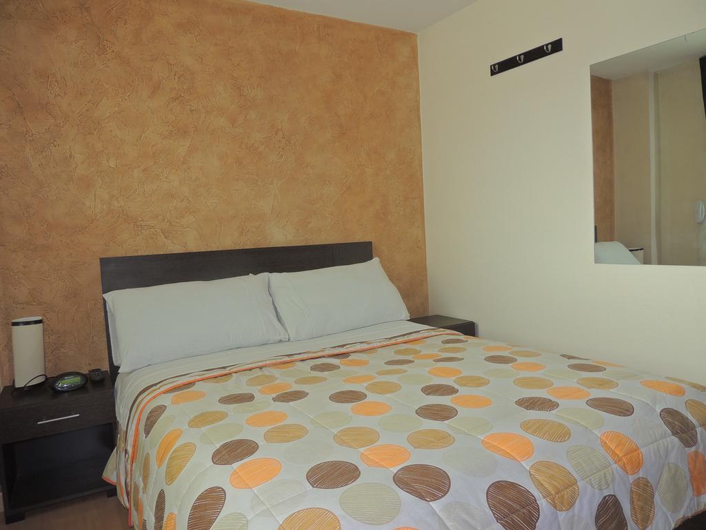 Titan Hotel & Spa Богота Номер фото